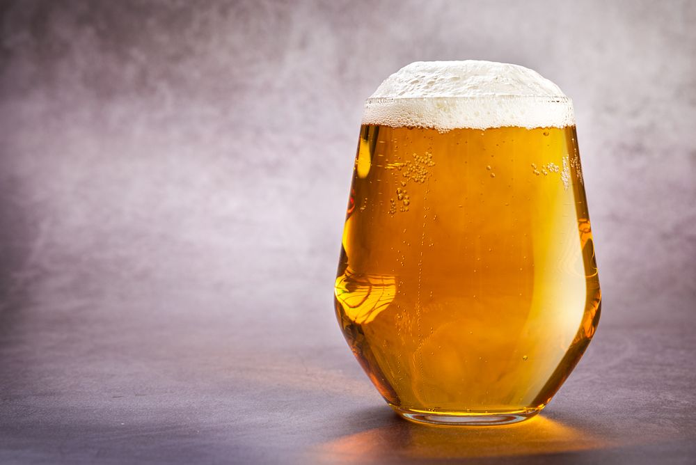 A glass of amber rye ale