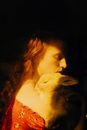 Painting of dreamy woman with rabbit on sunny day