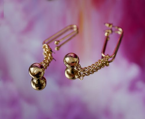 Close-Up Shot of Gold Earrings