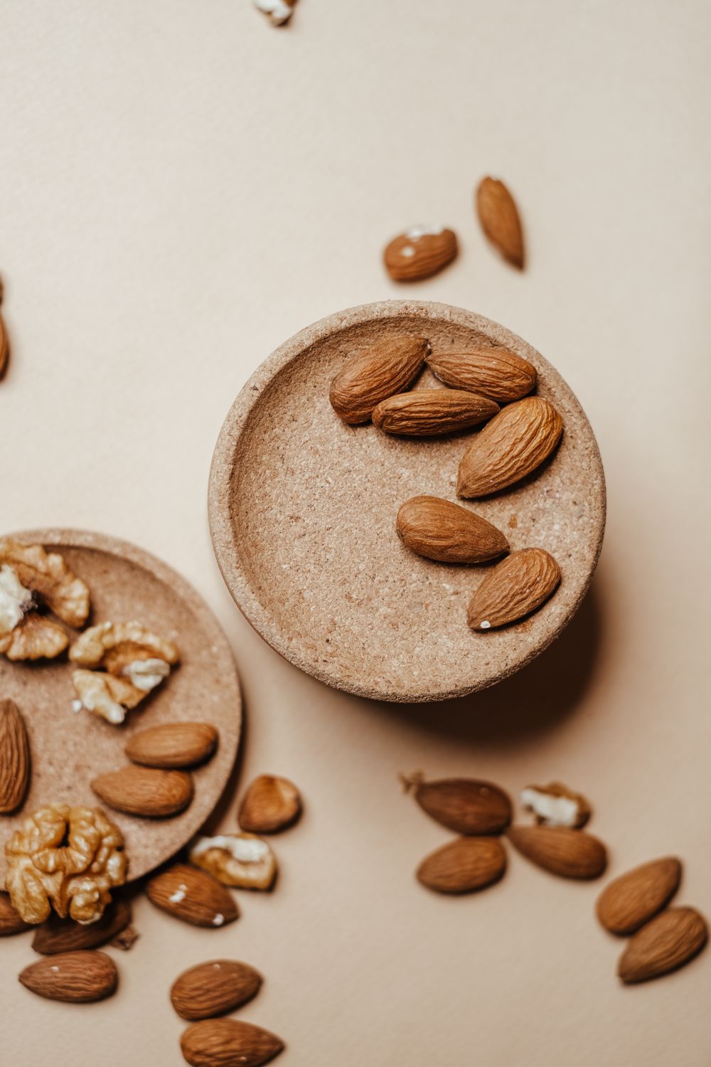 Almonds and walnuts representing nutty coffee flavours
