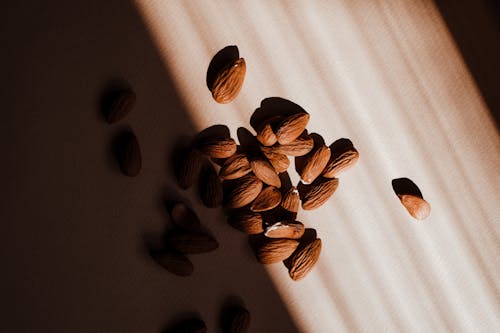 Nuts on Sunlit, White Background