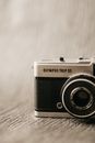 Vintage photo camera with title and lens