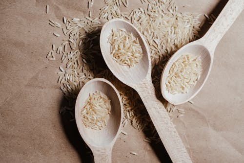 A White Rice on a Wooden Spoons