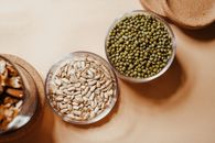 Brown and White Beans in Clear Glass Bowl
