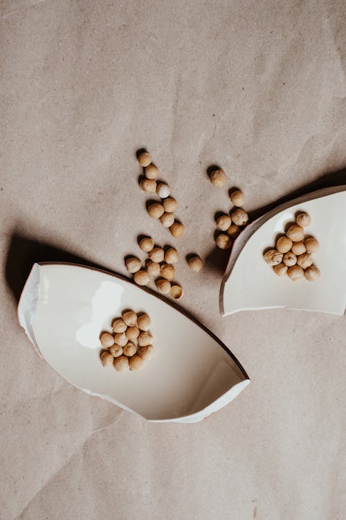 Free Chickpeas and a Broken Ceramic Plate Stock Photo