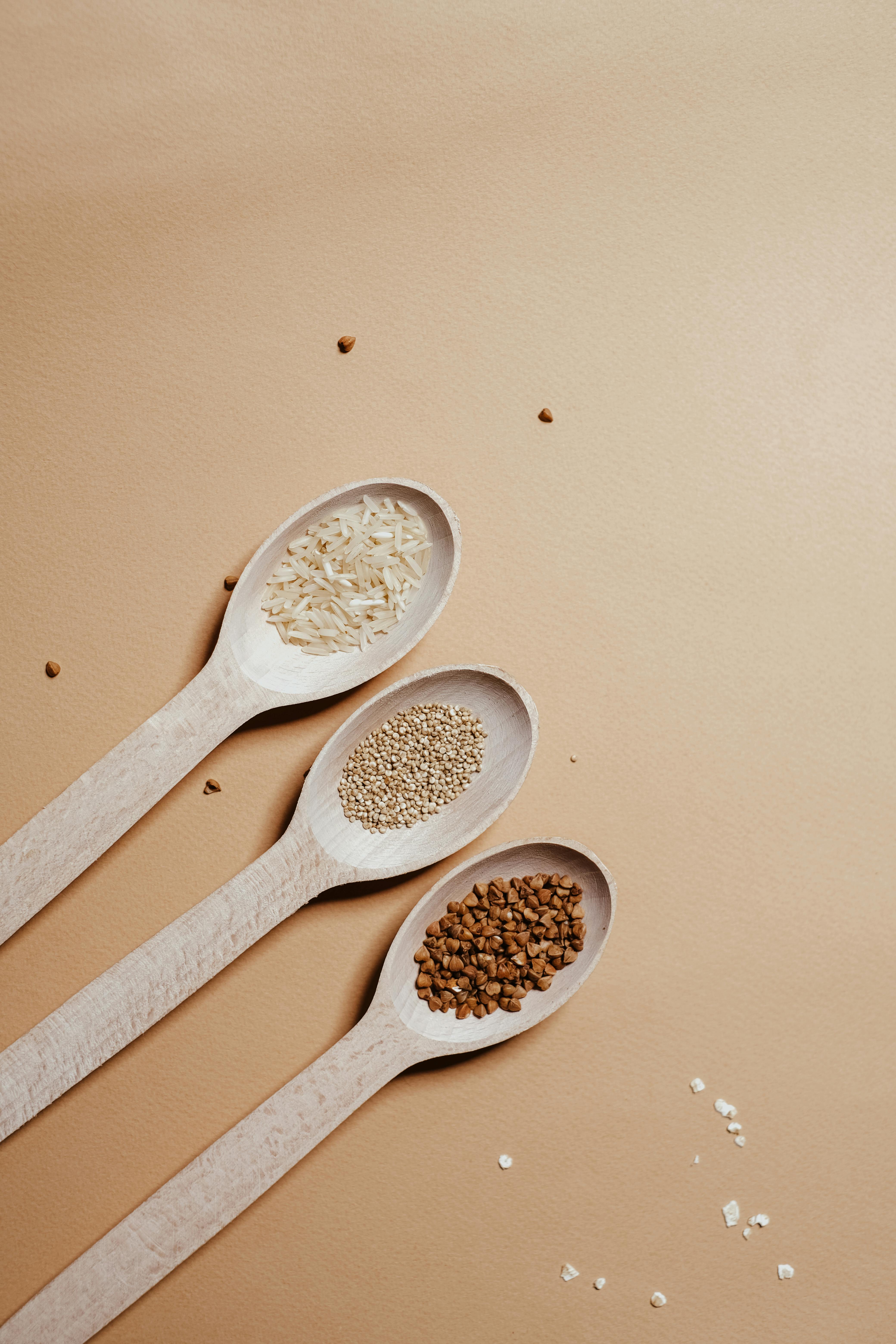 white wooden spoon with white powder