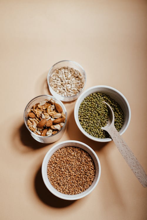 Grains and Seeds in Glass Jars and on  Bowls