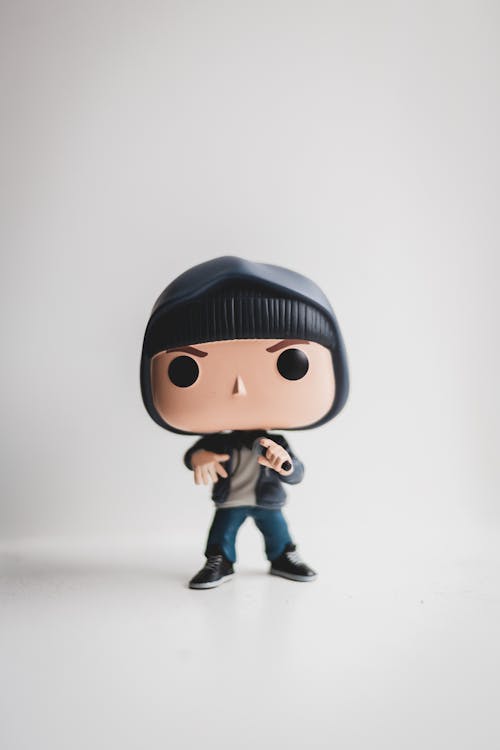 Full length of collectible little figurine of character of film wearing jeans and hoodie