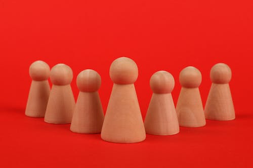 Wooden Sculptures with a Red Background