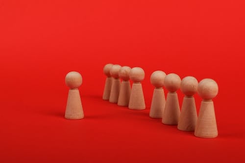 Wooden Sculptures with a Red Background