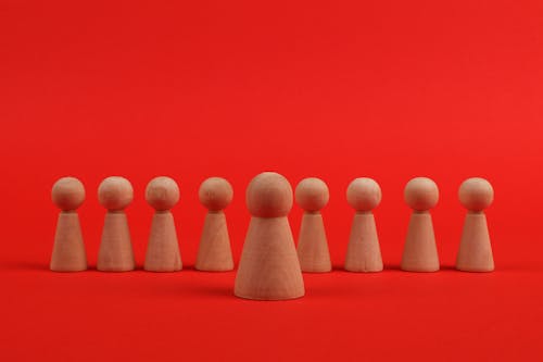 Wooden Sculptures with a Red Background