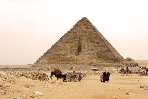 Free People Walking Near the Pyramid Stock Photo