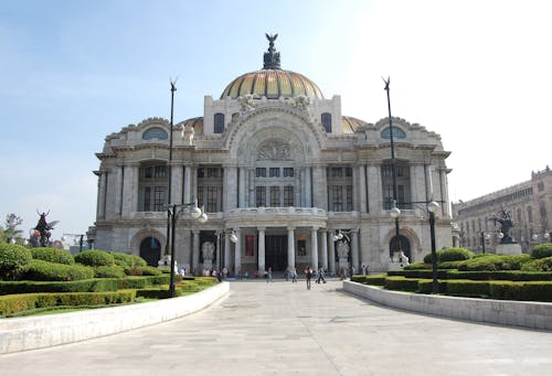 People Walking in Front of the Palacio De Bellas Artes