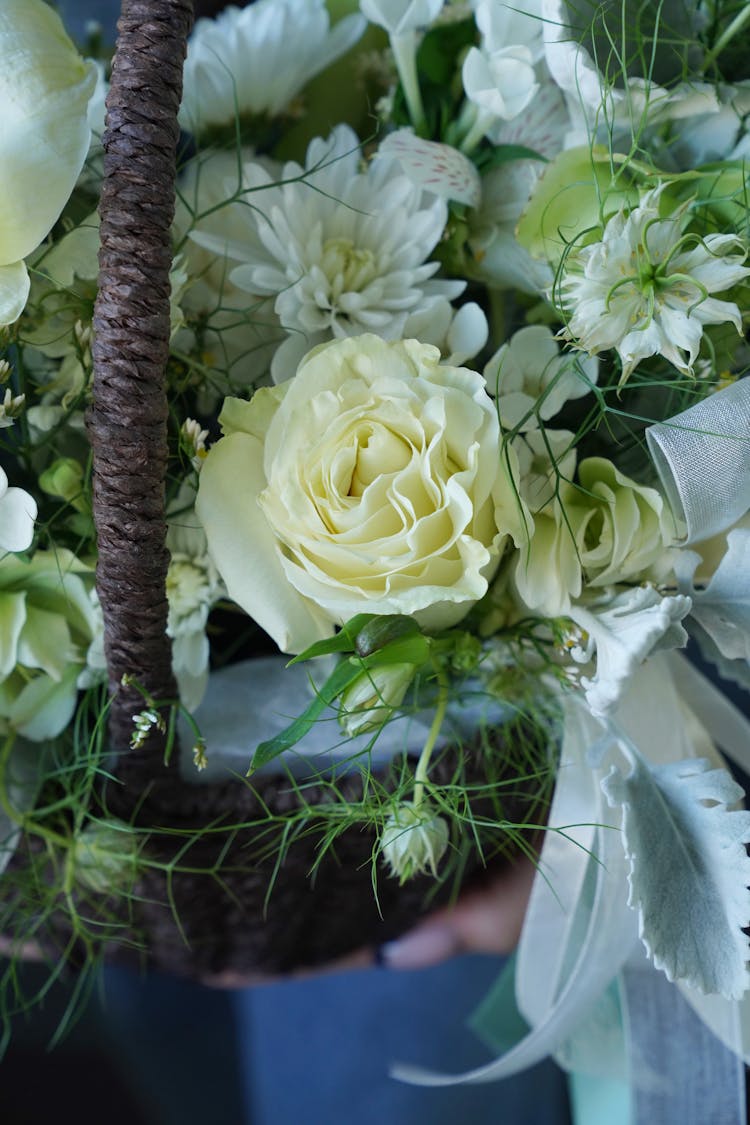 White Flower Arrangement In Basket