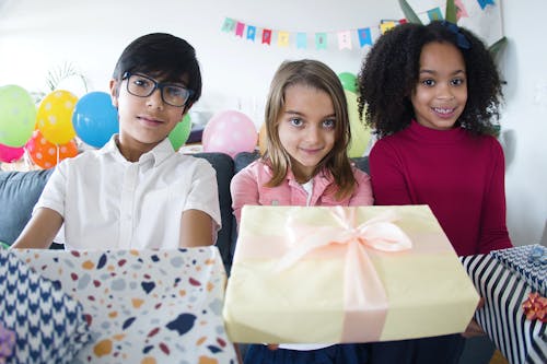 Free Kids Giving Presents Stock Photo