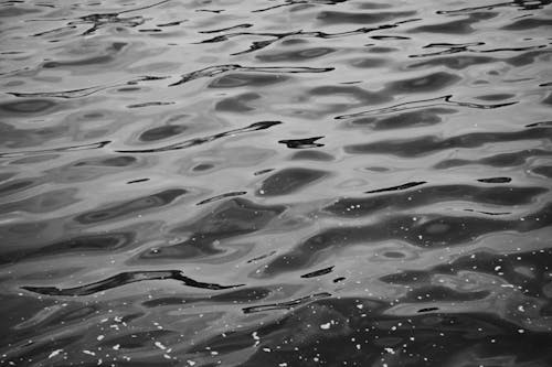 Free Black and white of abstract background of rippled water of sea in daytime Stock Photo