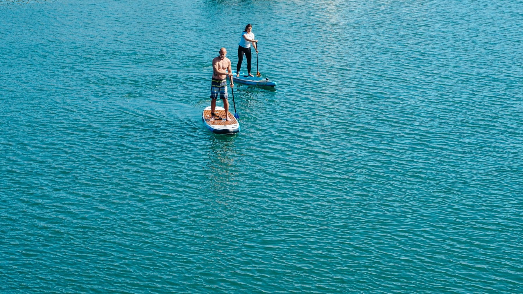 Paddleboarders enjoying the water in Orange County