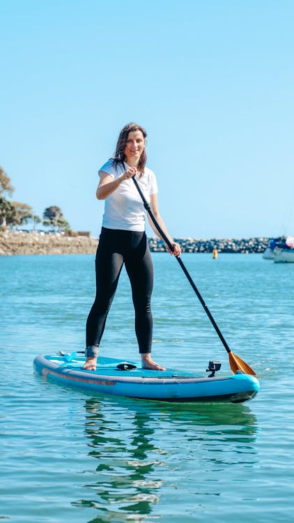 A Woman on a Paddleboard