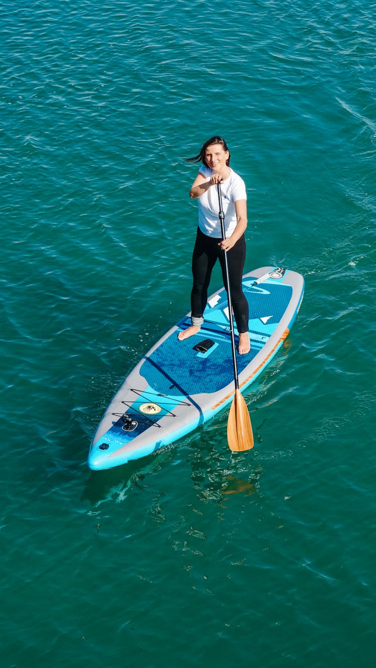 A Woman On A Paddleboard 