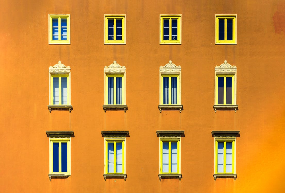 Windows of a Yellow Concrete Building