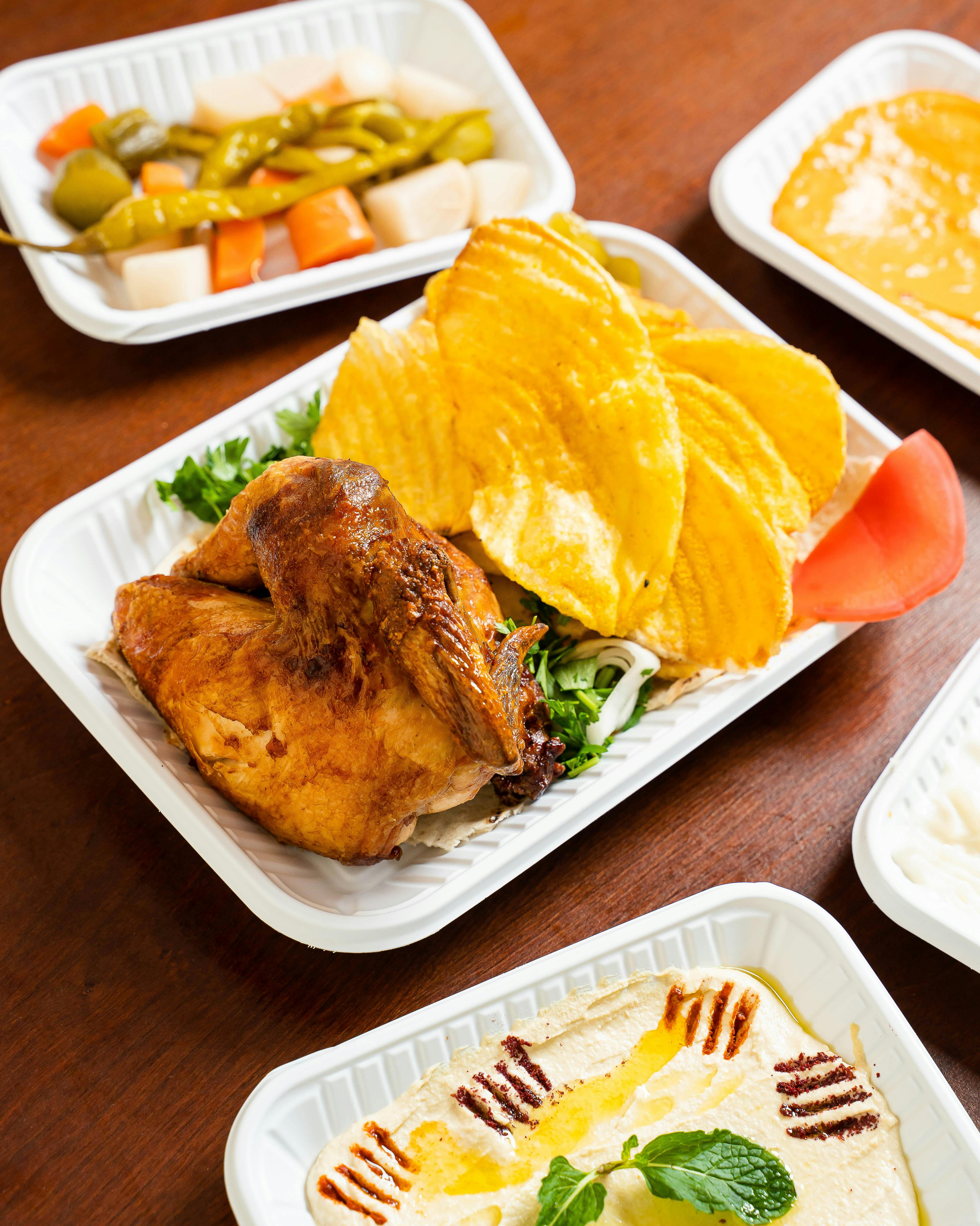 Low-carb salmon bowl with roasted vegetables and avocado dressing