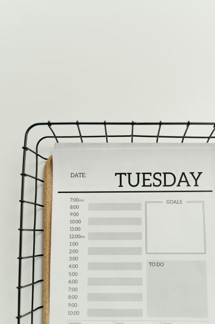 A daily planner page labelled Tuesday with hourly time slots, goals and a to-do list