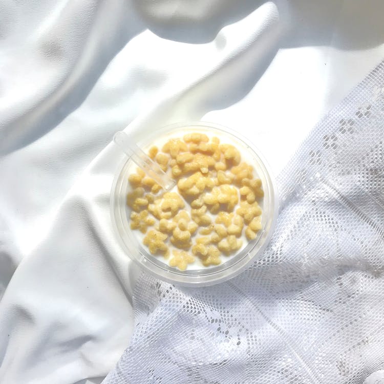 Overhead Shot Of A Bowl With Milk And Cereal