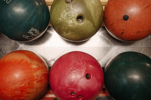 Free Close-Up Photograph of Colorful Bowling Balls Stock Photo