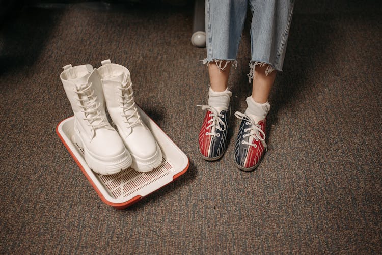 A Person Wearing Bowling Shoes