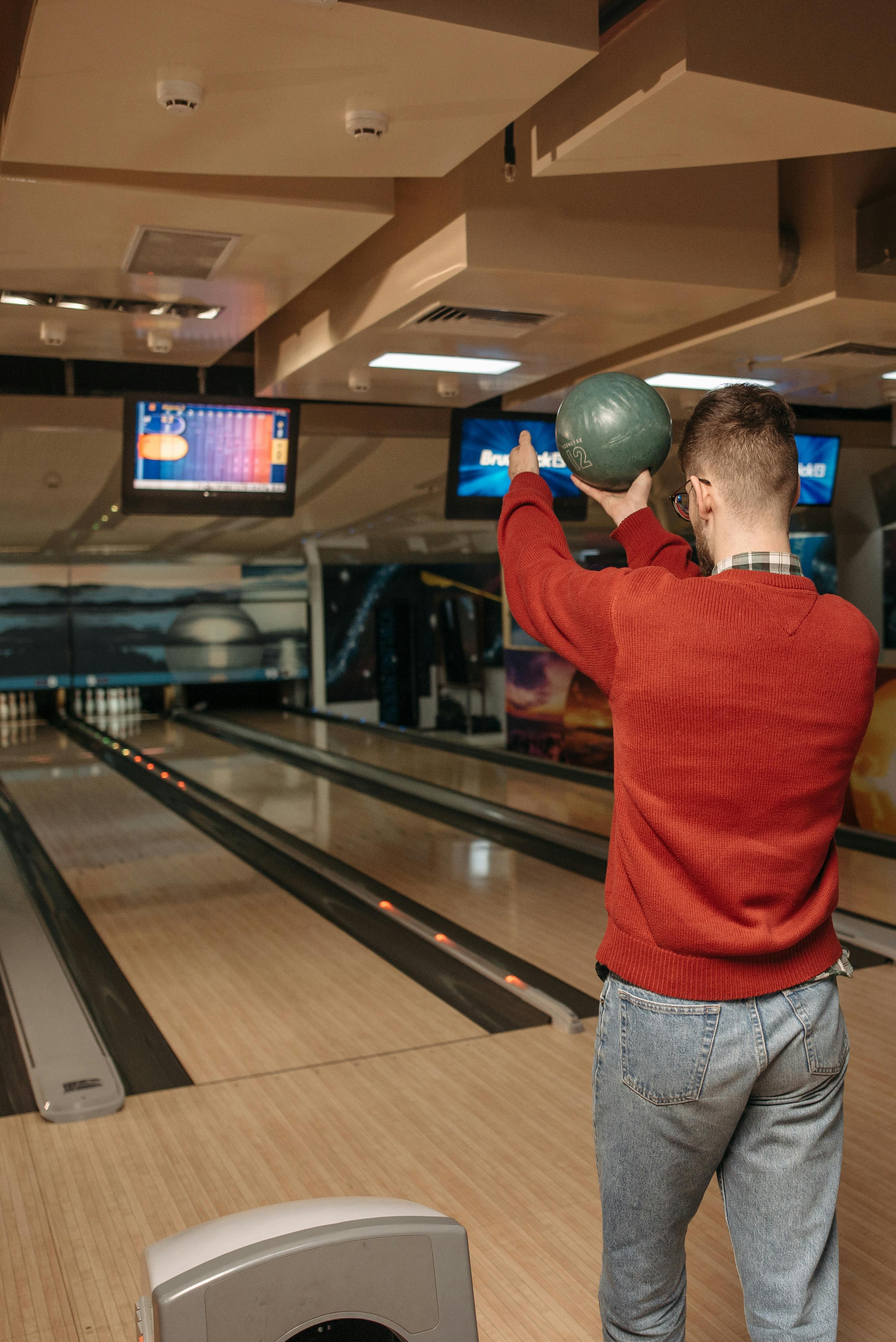 a man playing bowling