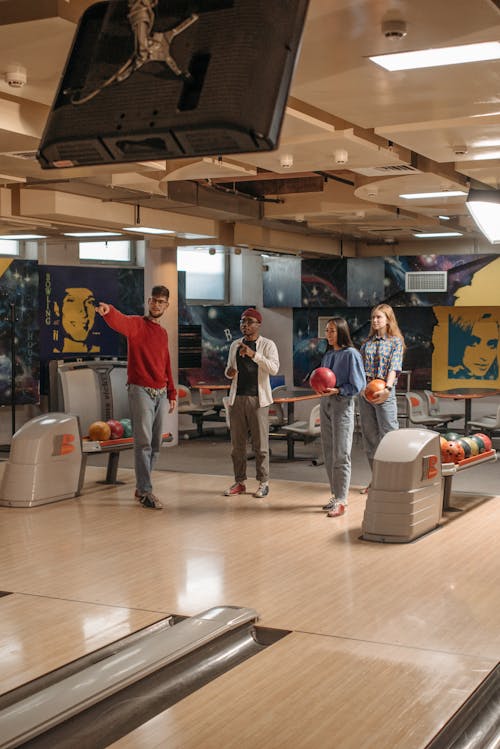 Free Friends Playing Bowling for Recreation Stock Photo
