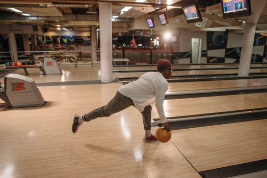A Man Releasing a Bowling Ball