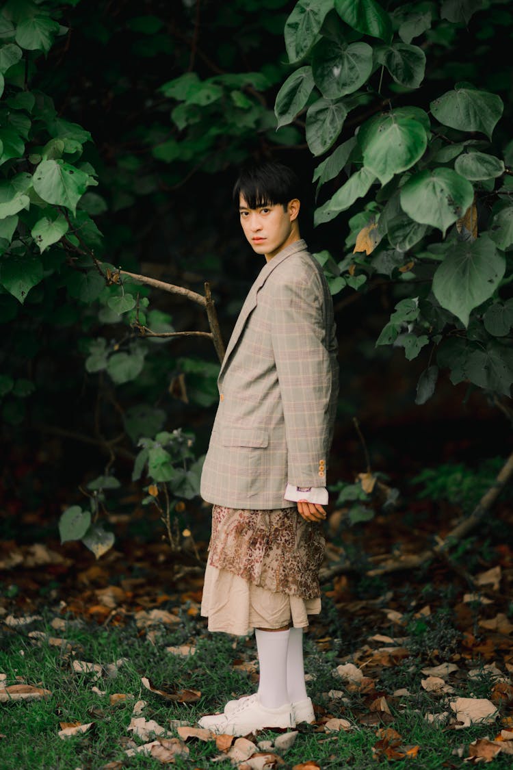 Woman In Suit And Skirt