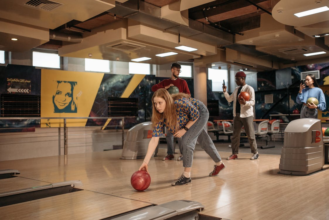 Free A Woman Playing Bowling Stock Photo