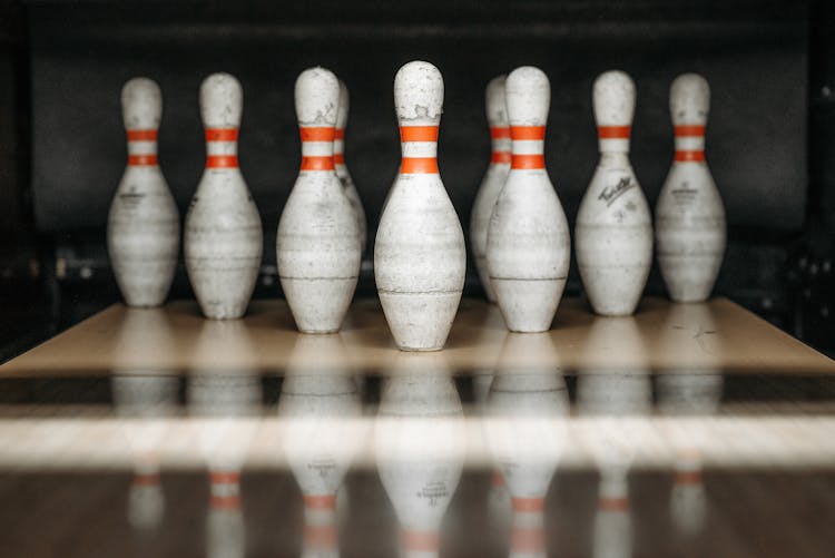 White And Red Bowling Pins