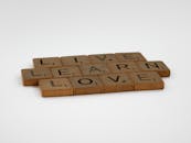 Brown Wooden Blocks on White Surface
