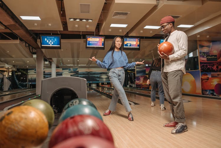 A Man And A Woman In The Bowling Alley