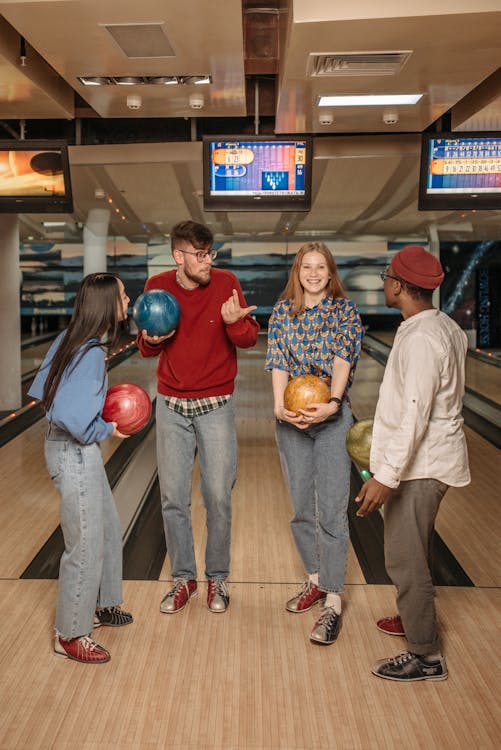 Free Friends Holding Bowling Balls Stock Photo