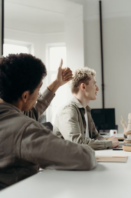 Professional team engaged in collaborative discussion in a modern office setting. Professional team engaged in collaborative discussion in a modern office setting.