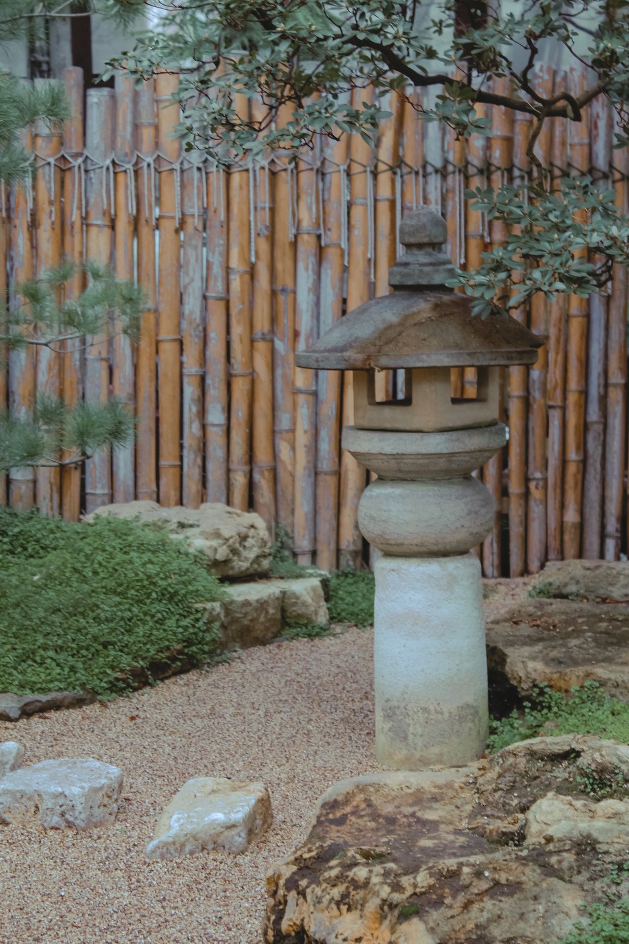 bamboo-pole-edging Bamboo fence in a Japanese garden