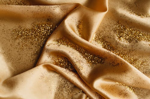 A Gold Glitters on a Silk Fabric