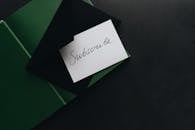 White Card on Top of an Envelope