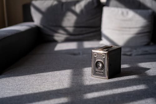 Free A Vintage Camera on a Gray Surface Stock Photo