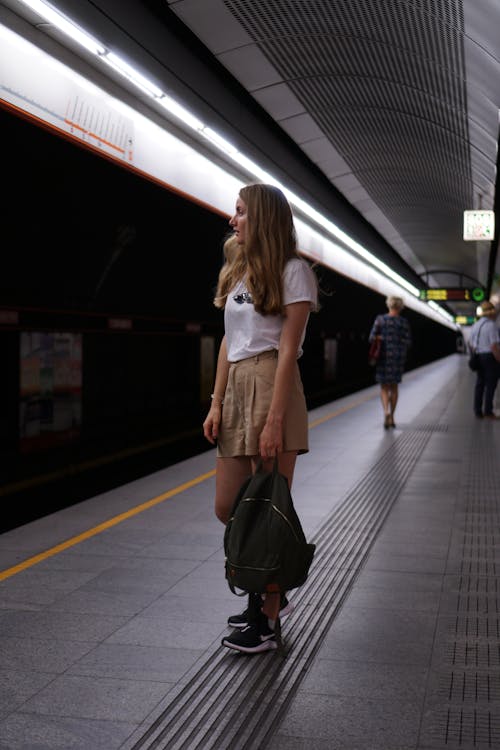 A Woman Standing on the Platform