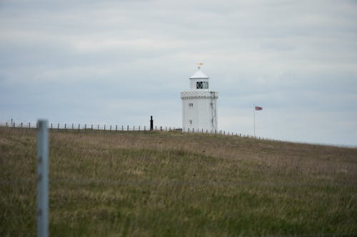 Foto profissional grátis de área, construção, farol