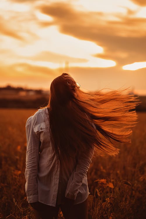 A Woman Standing with Long Hair