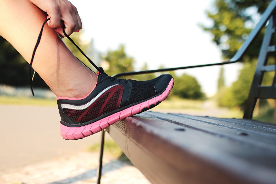 Free Person Foot on Bench Stock Photo