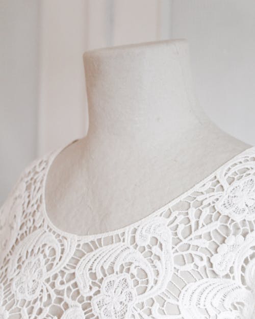 Free White Floral Lace Shirt in a Mannequin Stock Photo