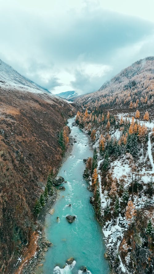 An Aerial Shot of a River between Mountains
