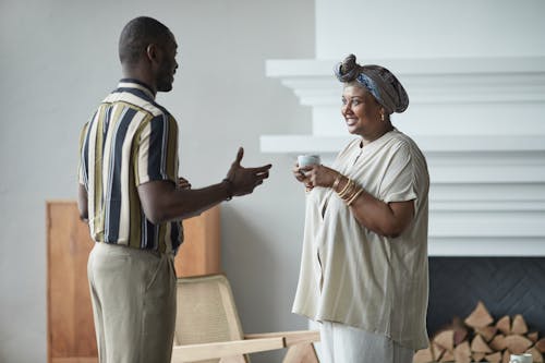 Kostenloses Stock Foto zu afroamerikaner-frau, afroamerikanischer mann, büro